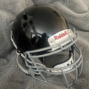 Brand new. Never worn. Riddell Football Helmet.